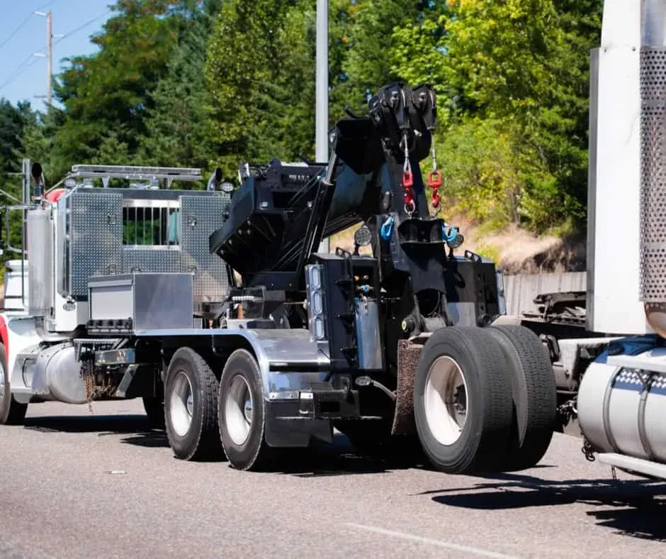 heavy-duty wrecker on a Minnetonka highway shoulder