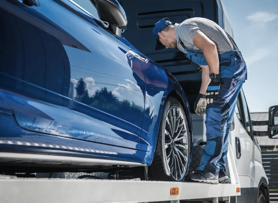 Minneapolis local tow truck loading vehicle